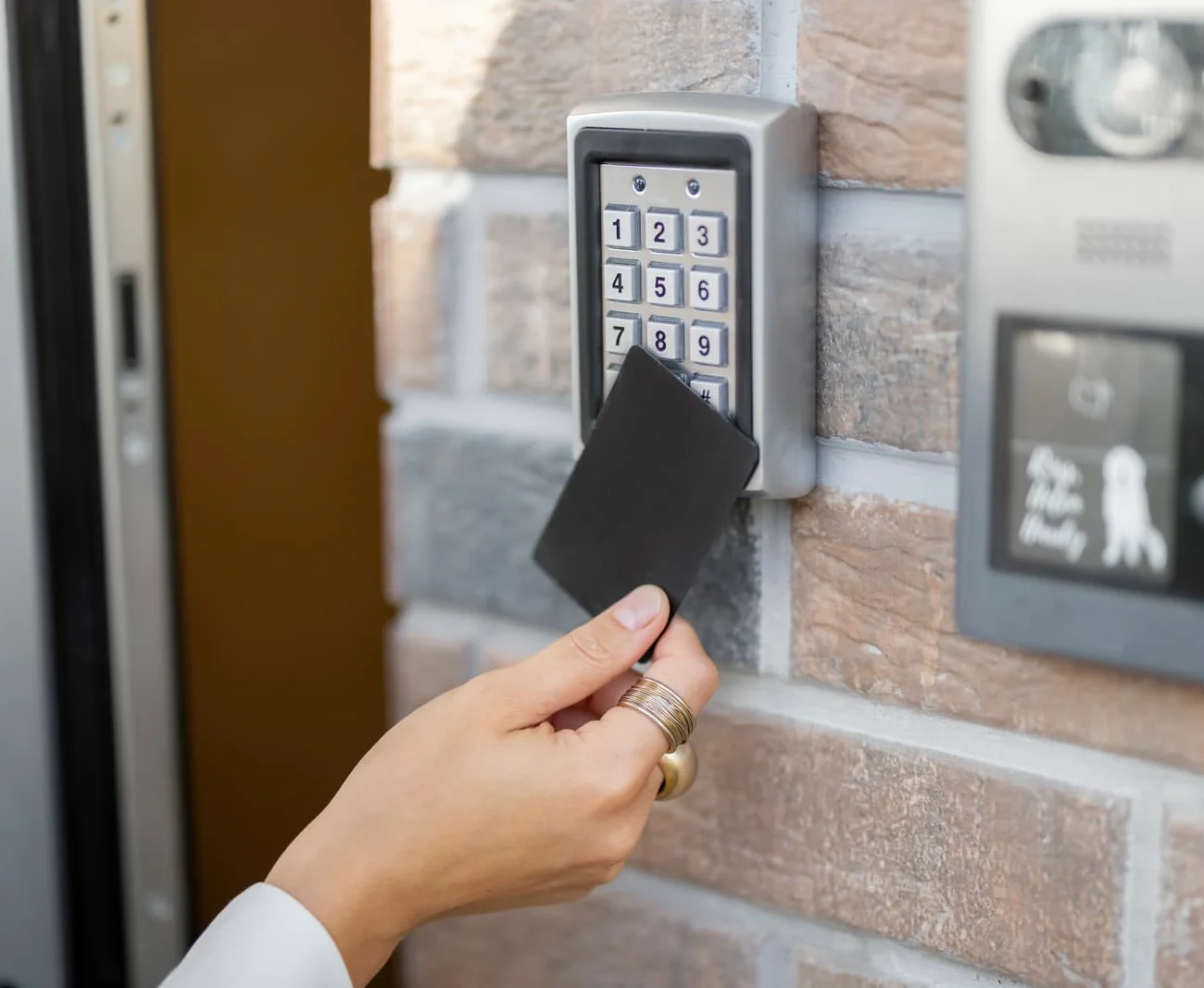 Attaching card to the electronic reader to access the building